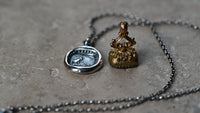 Cat and mouse seal necklace