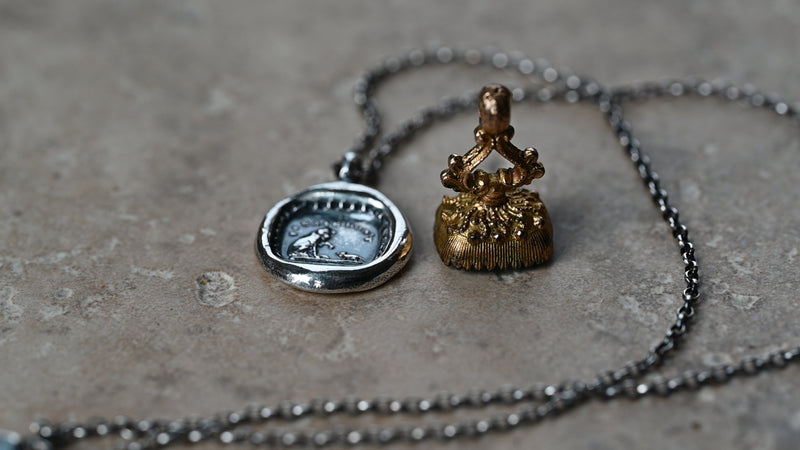 Cat and mouse seal necklace