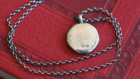 Cat and mouse seal necklace