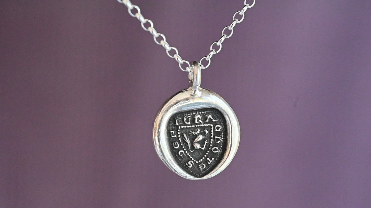"I crack nuts deep" medieval seal necklace