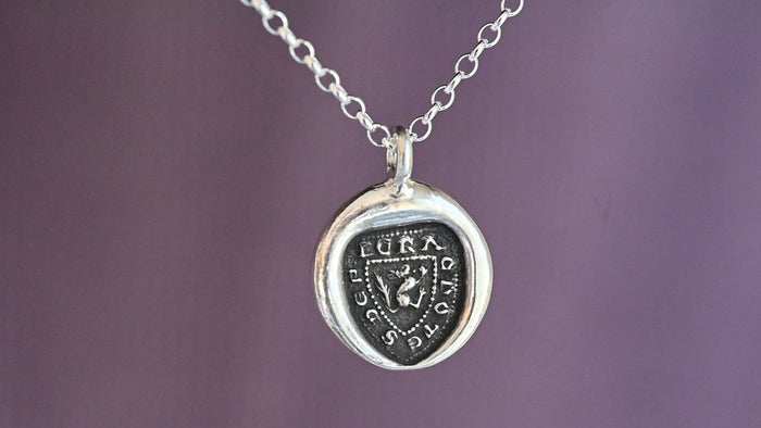 "I crack nuts deep" medieval seal necklace