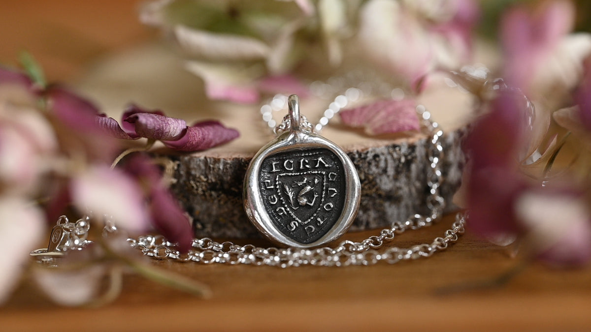 "I crack nuts deep" medieval seal necklace