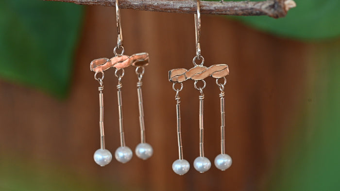 Gold crotalia earrings