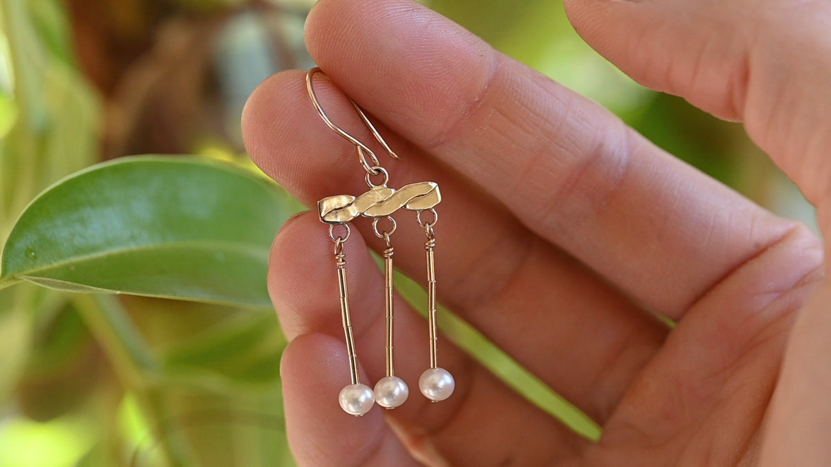 Gold crotalia earrings
