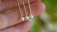 Gold crotalia earrings