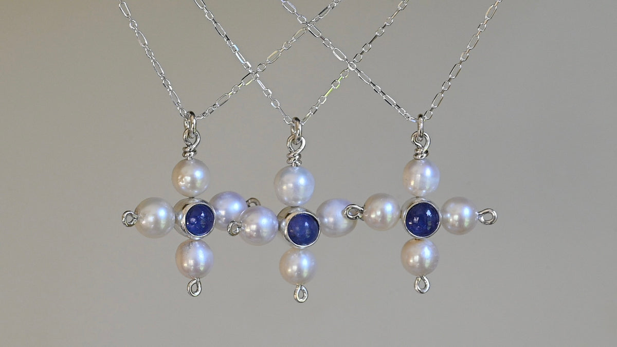 Pearl cross pendant